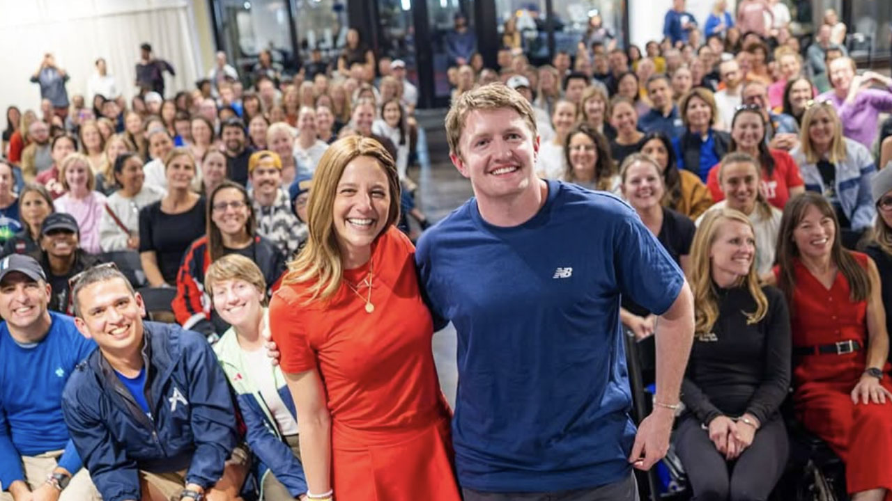 Alison Feller smiles with Eric Jenkins
