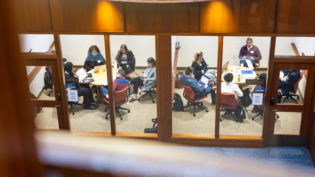 Overhead shot of people sitting in rooms