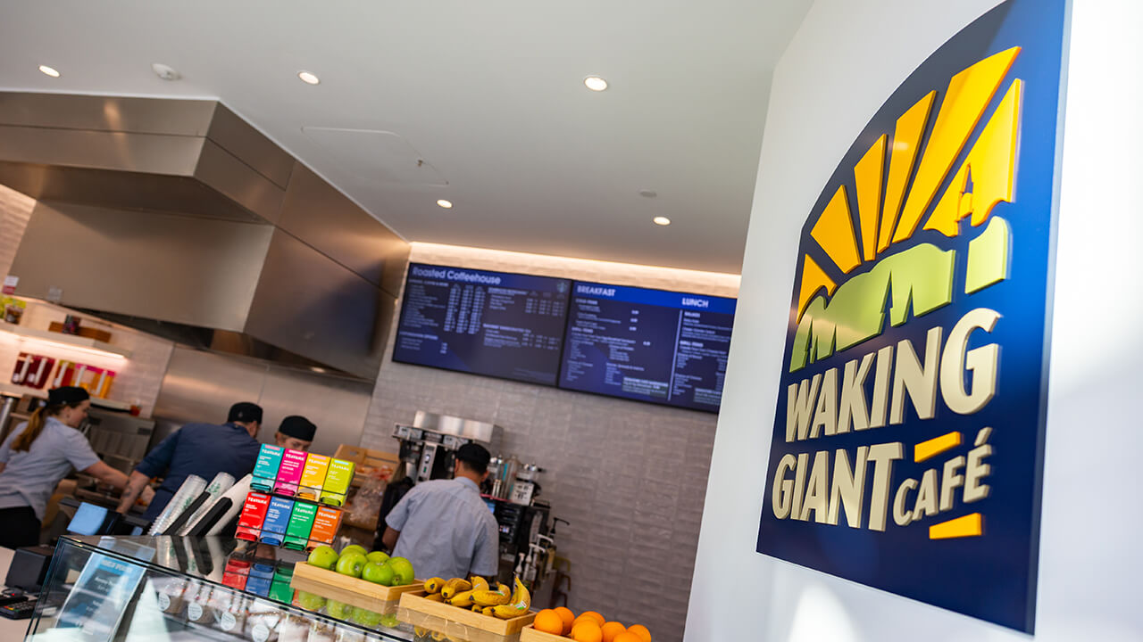 Store name sign at the Waking Giant Cafe