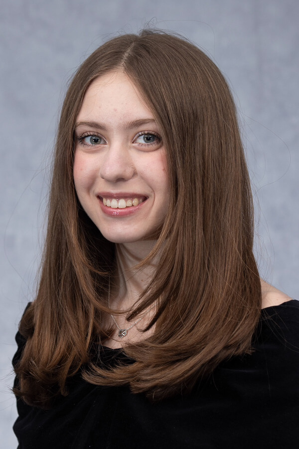 Headshot of Stephanie Xenos.