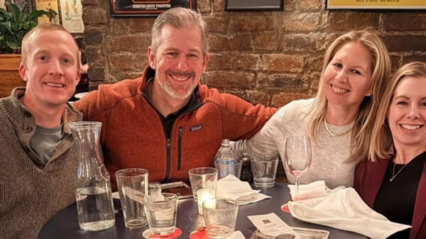 Freshman Roommates Dana Cirincione-Welles and Charity Kuchyt reconnect in New York City and enjoy dinner with their spouses at a restaurant