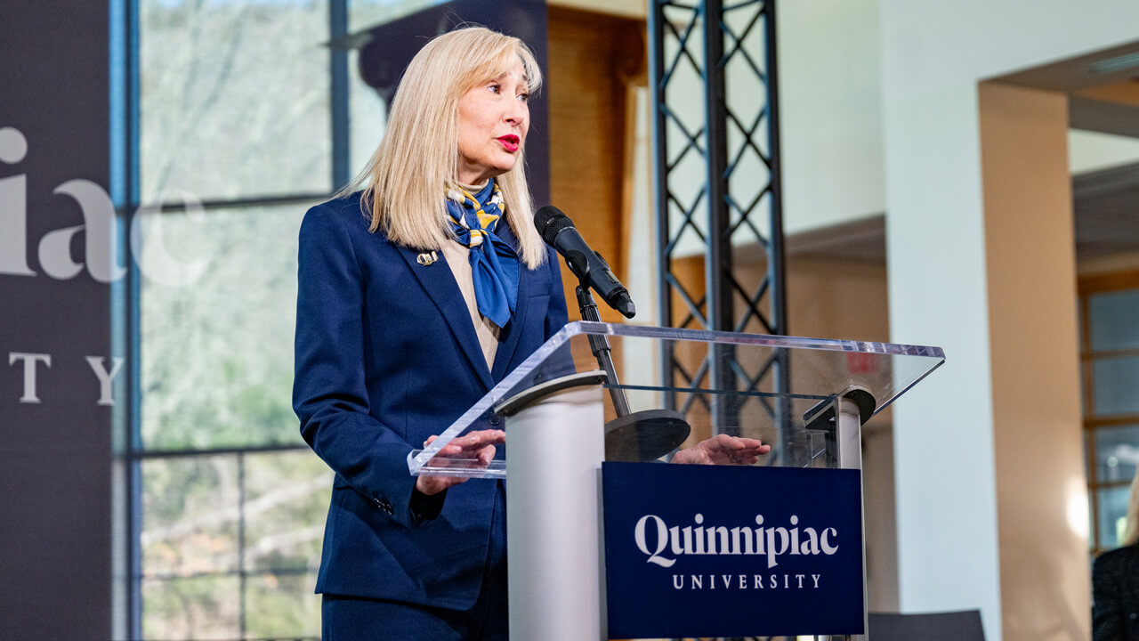 Incoming President Hardin speaks at a podium