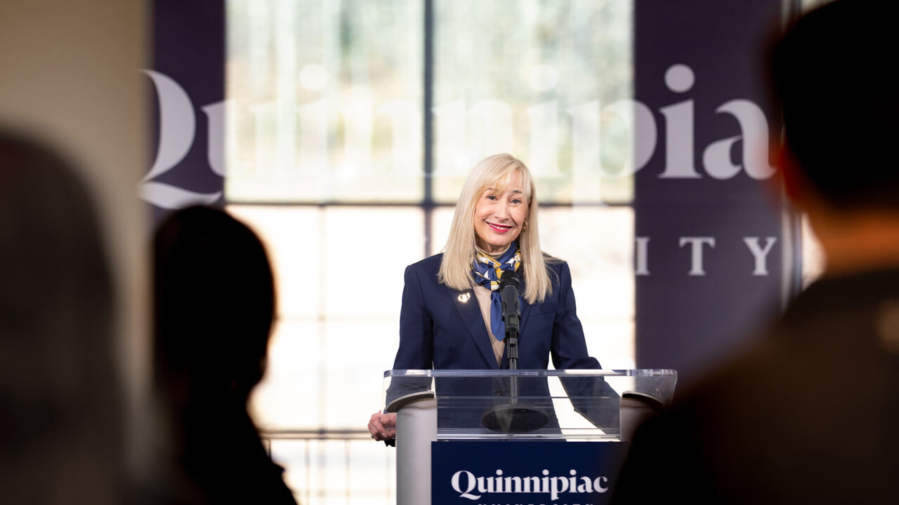 Incoming President Hardin speaks at a podium