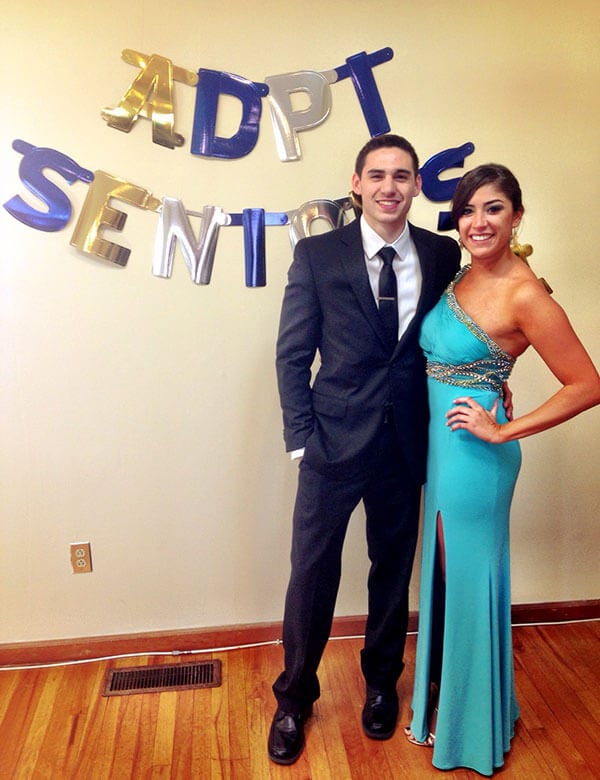 michele and mark spillane posing for a picture at a sorority formal