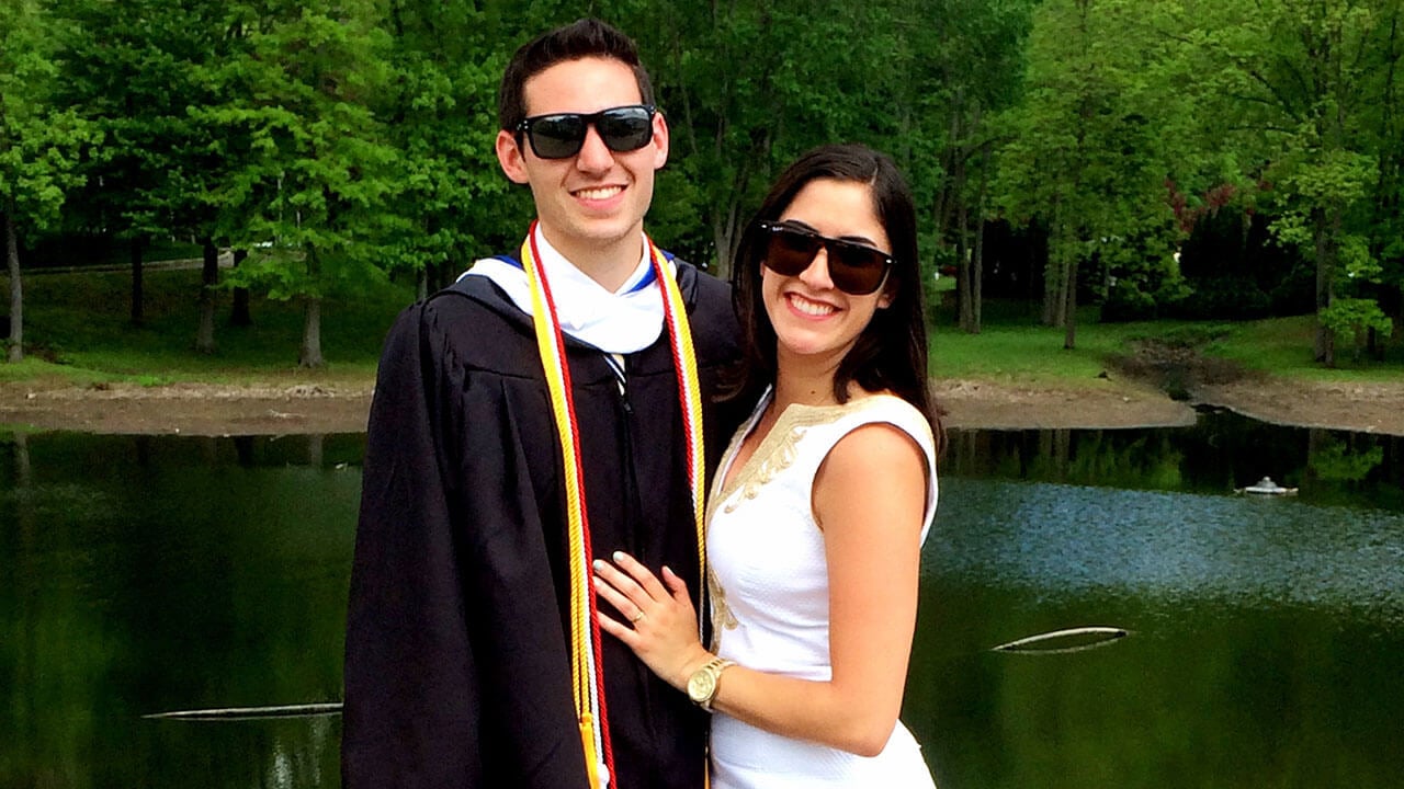 michele and mark spillane pose together at mark's graduation