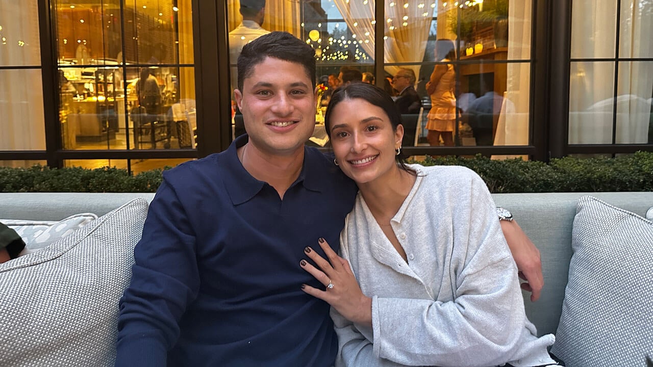 taylor parenti and matt coopersmith pose together after getting engaged