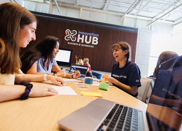 Students gather in the Innovation Hub to discover and develop social enterprise and business ventures that can change the world.