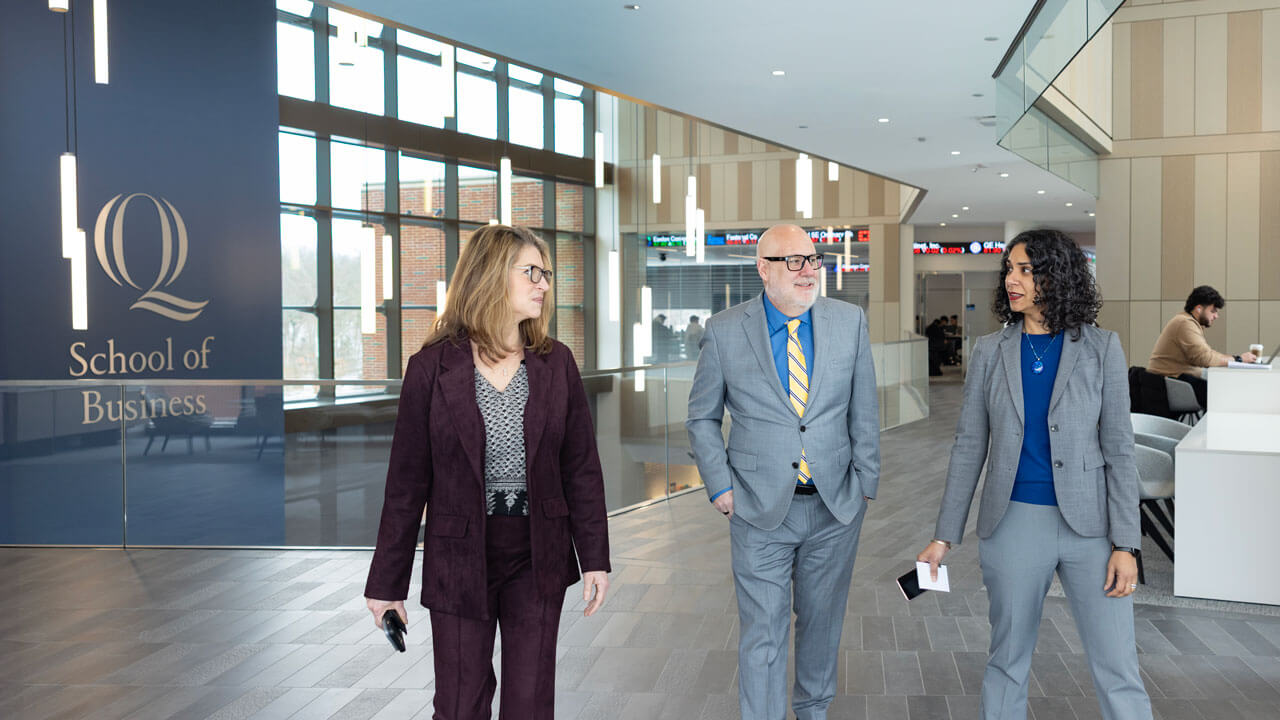 Deans walk the halls of the School of Business