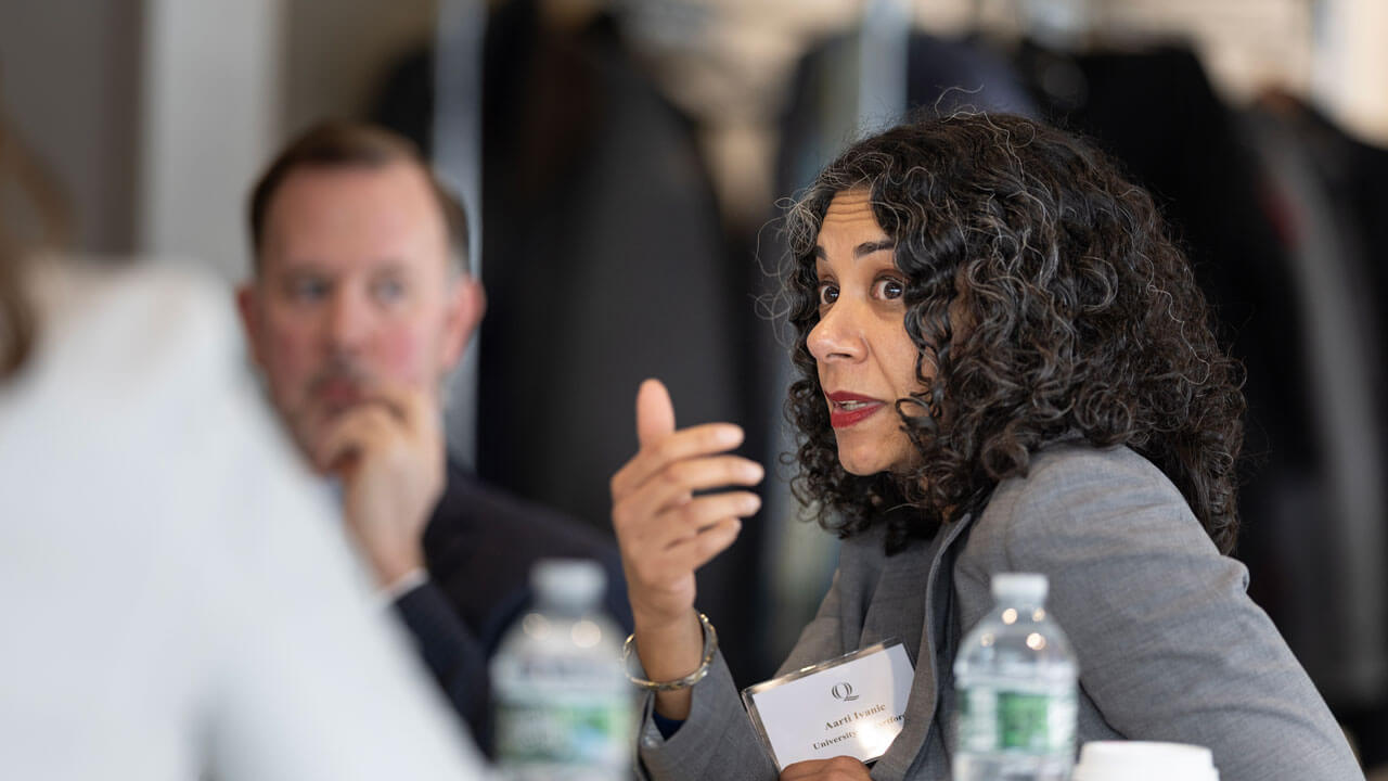 Aarti S. Ivanic, University of Hartford, talks to the deans
