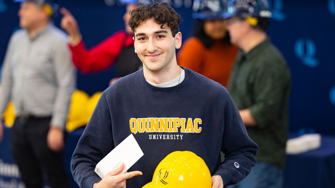 Student proudly receives hard hat