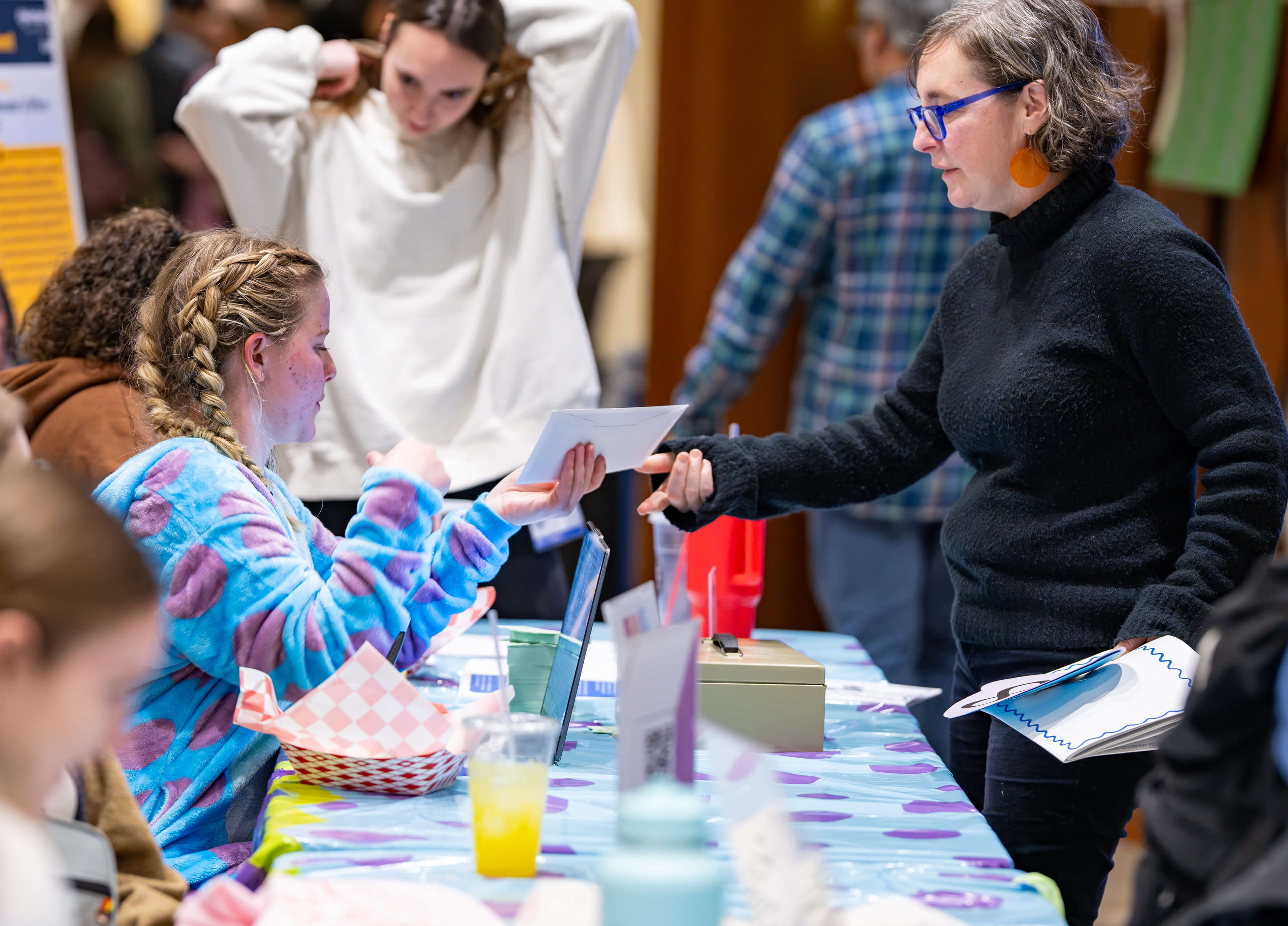 Individual at table at the PILP Auction