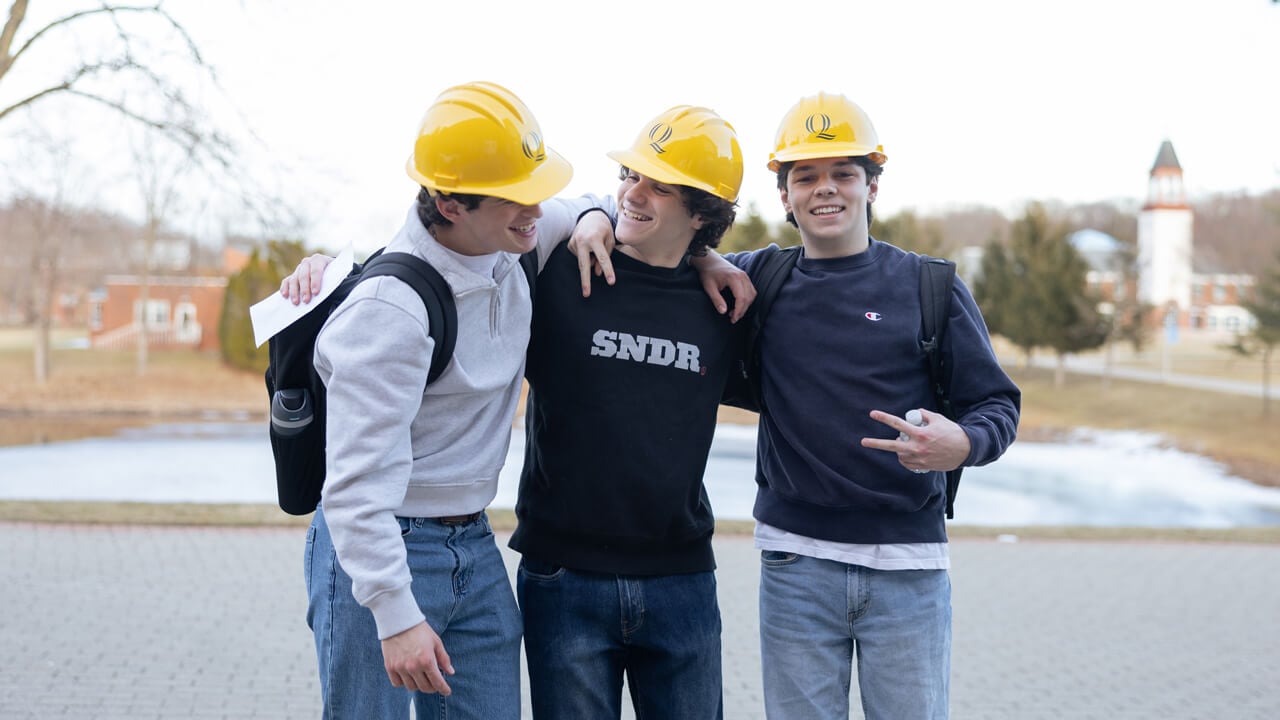 Three people posing for a photo