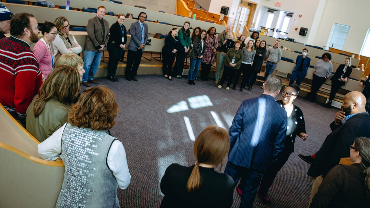 All of the attendees speak in a circle.