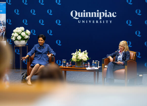 Indra Nooyi sits with President Olian