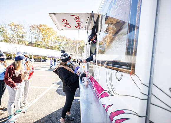 Students in line for a food truck