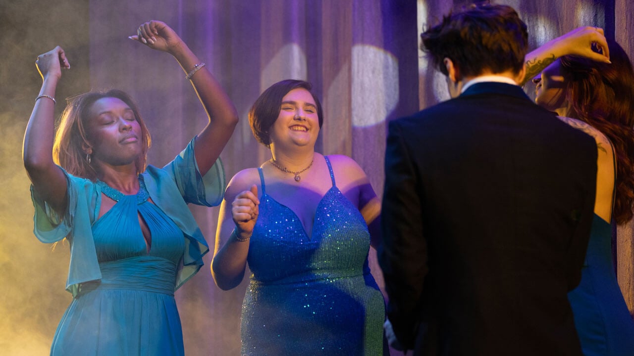 Quinnipiac students dancing together smiling in the spring play