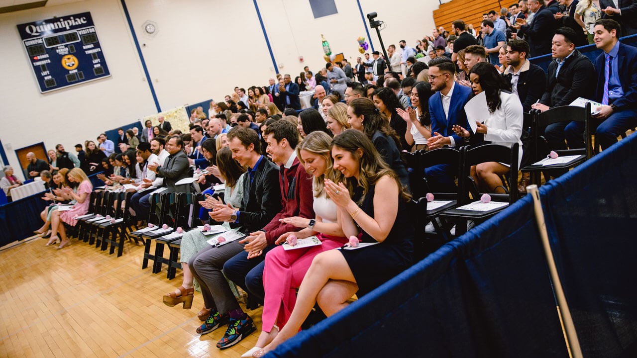 Graduate students waiting for ceremony to begin