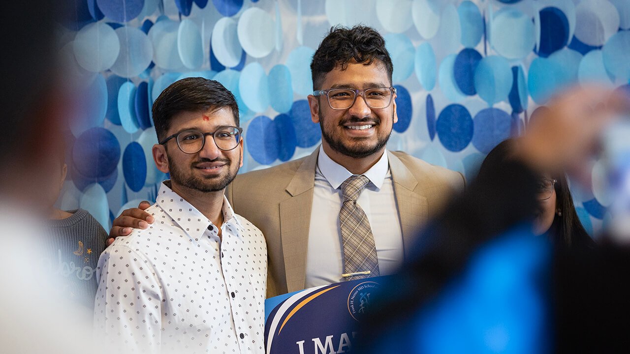 Two students posing on Match Day