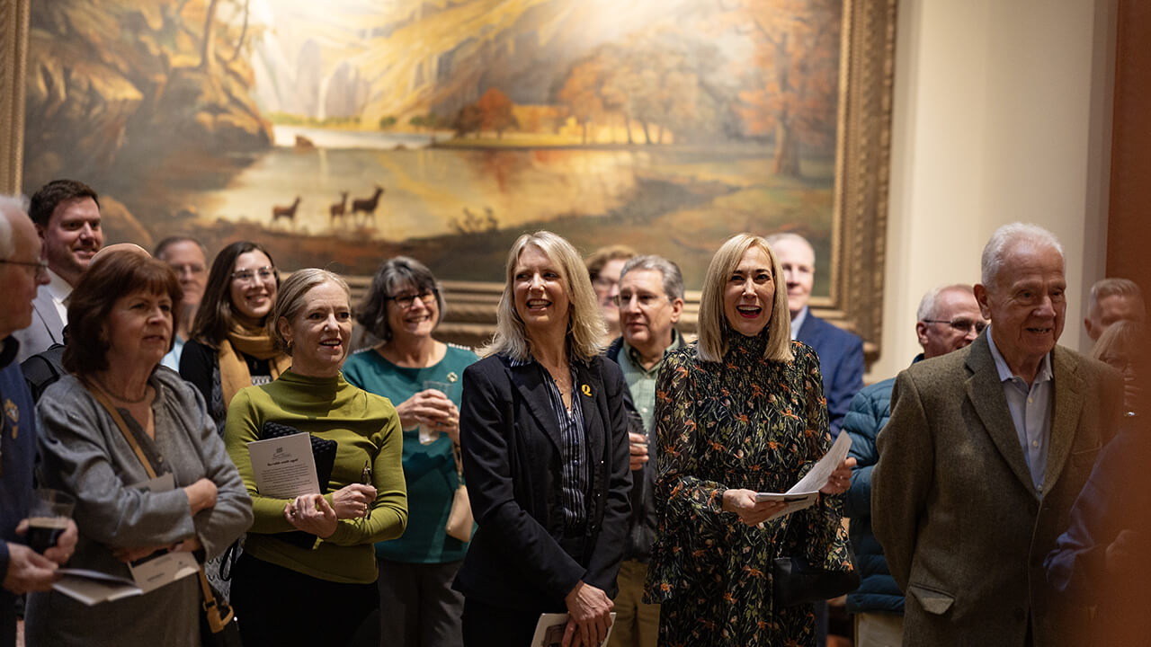 Community members gathered in for a photo in the Ireland Great Hunger Museum