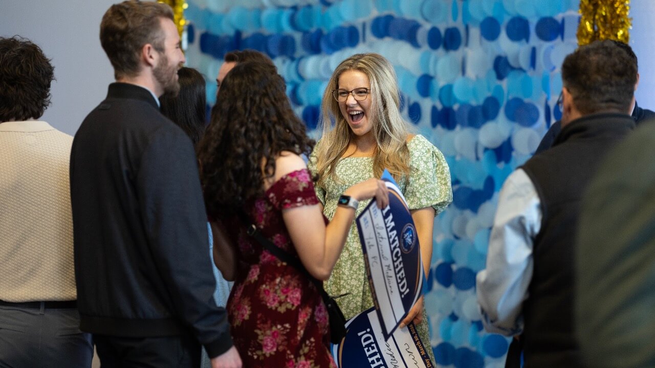 Students celebrating on match day