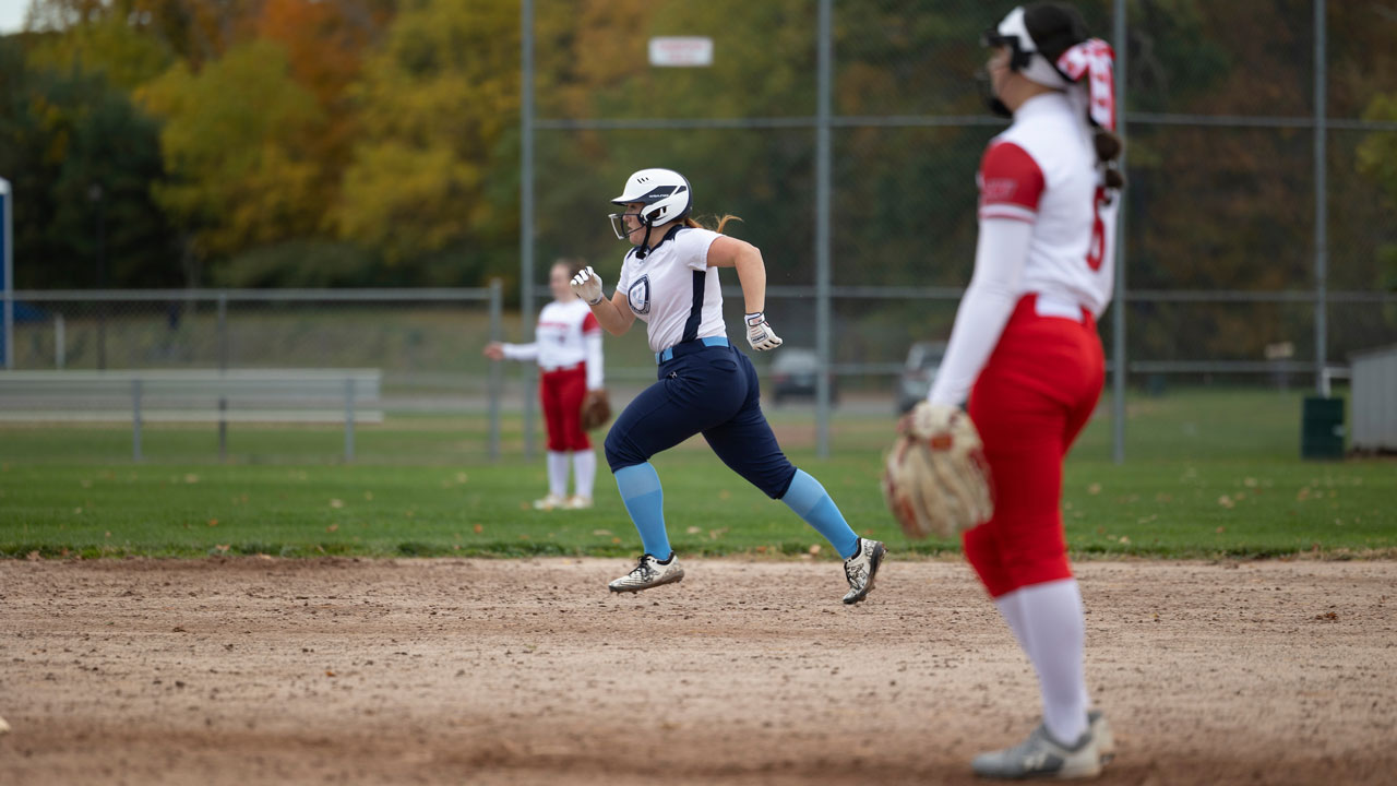 Woman running to base for safety