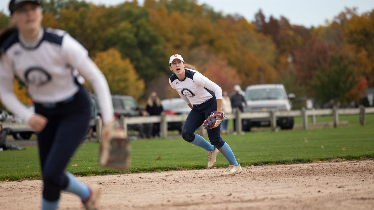 Student running to try to catch the ball