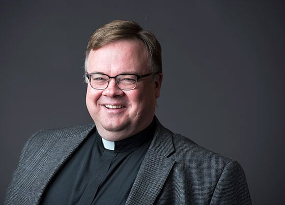 Headshot of Father Jordan Lenaghan