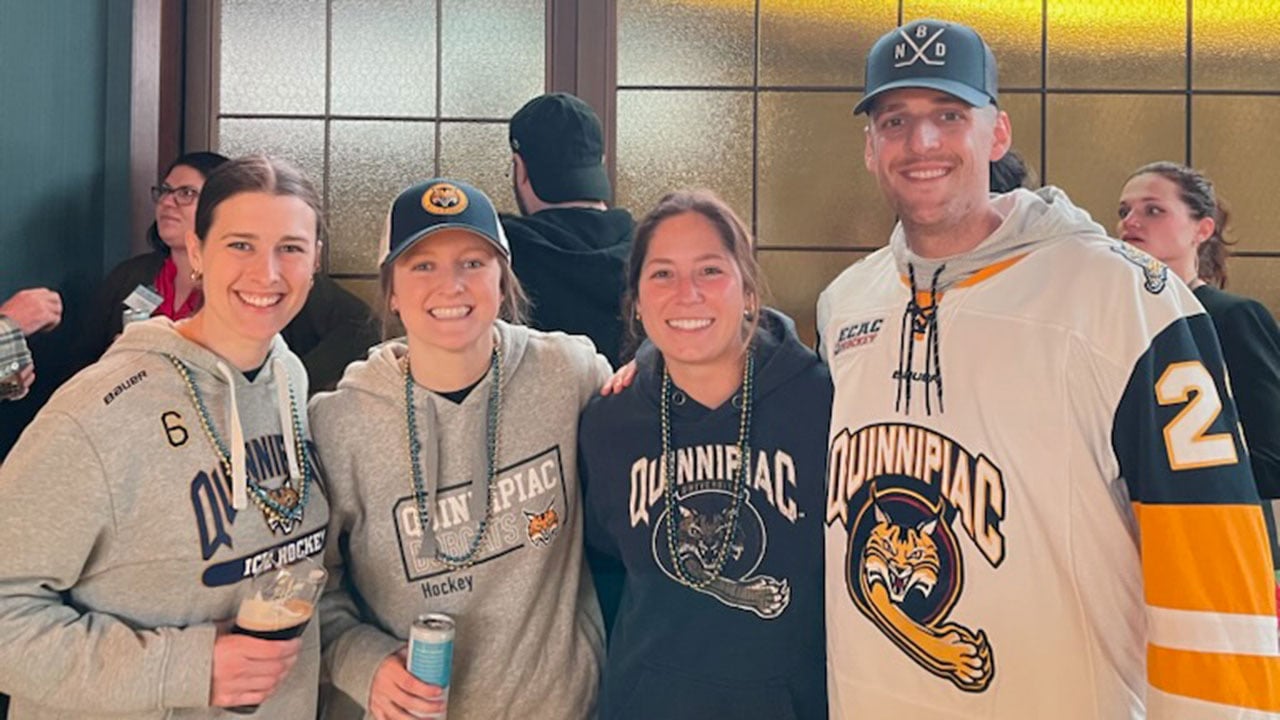 Bobcats cheer at a watch party in New York City