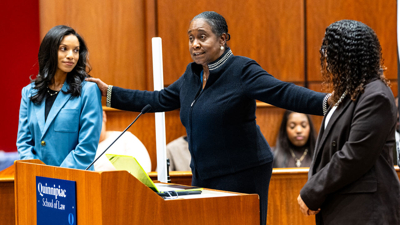 Presenter gives speech honoring two people