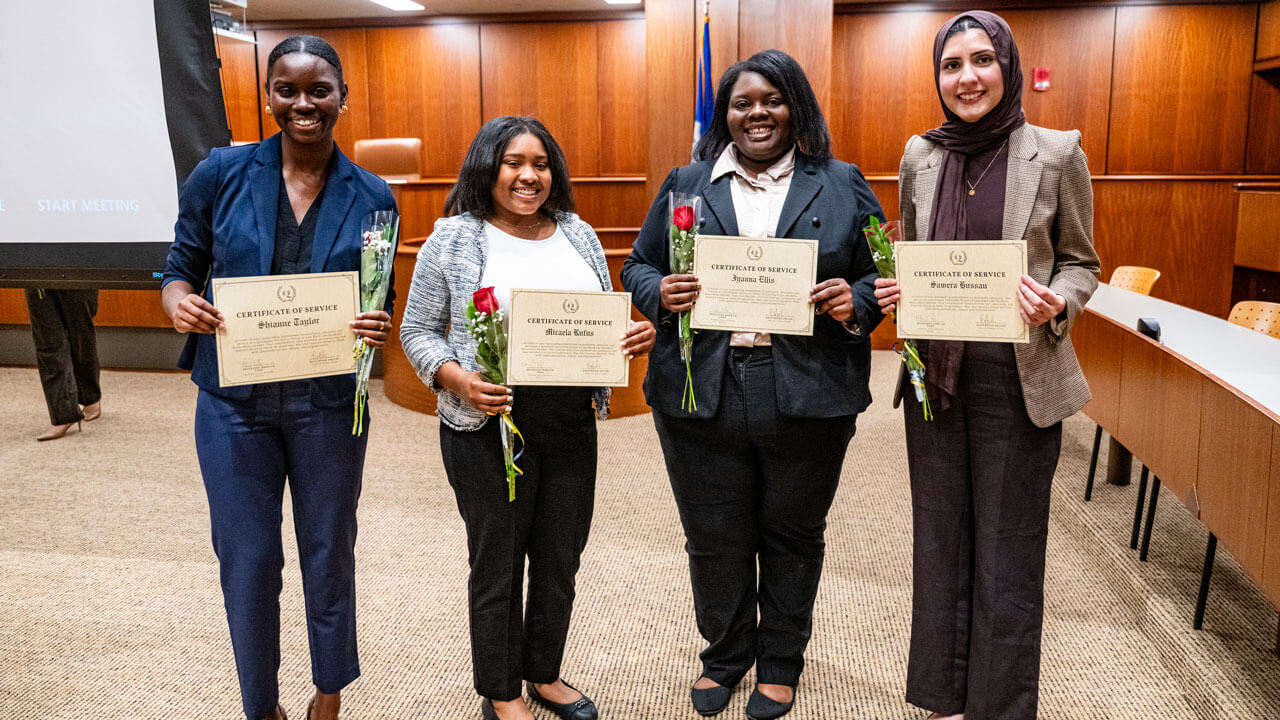 Honorees pose with their awards