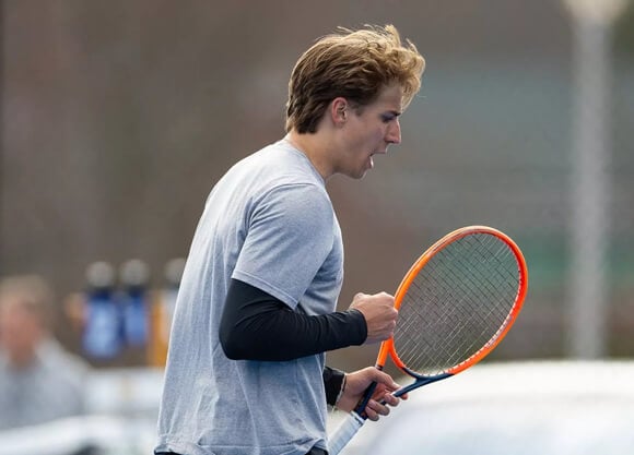 Tennis player celebrating
