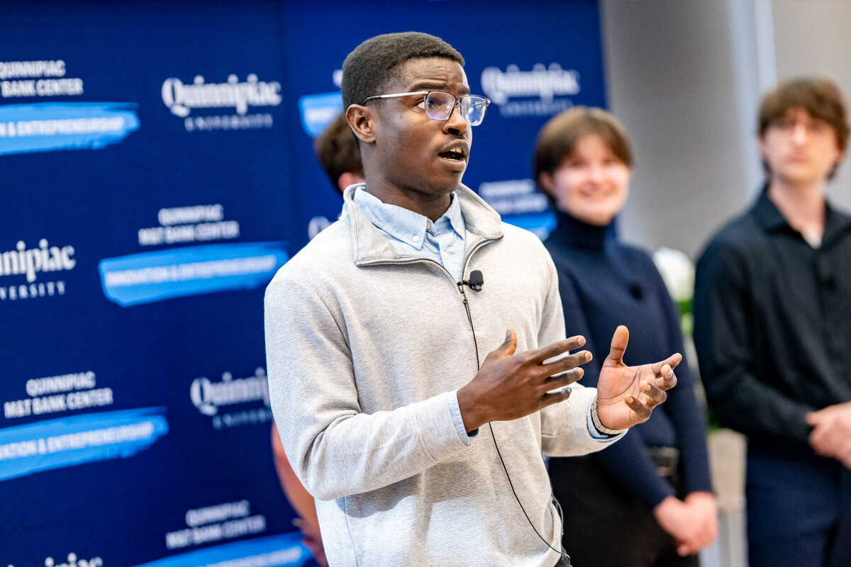 student pitches to judges