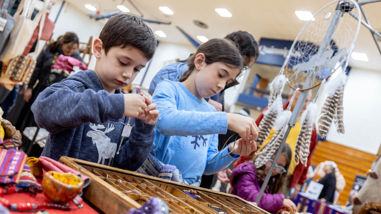 Children participating in the Dancing in the Shadow of Sleeping Giant powwow at Quinnipiac