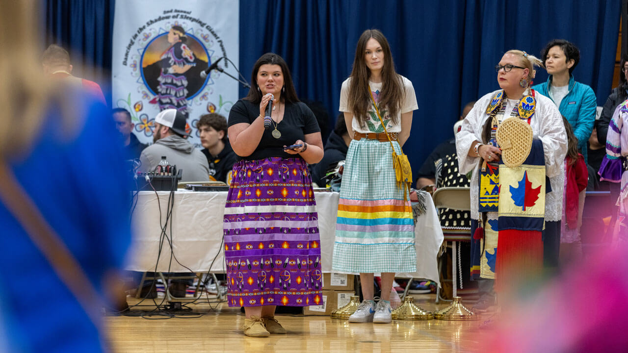 Participants in traditional dresses take part in the Shadow of Sleeping Giant Powwow hosted by Quinnipiac