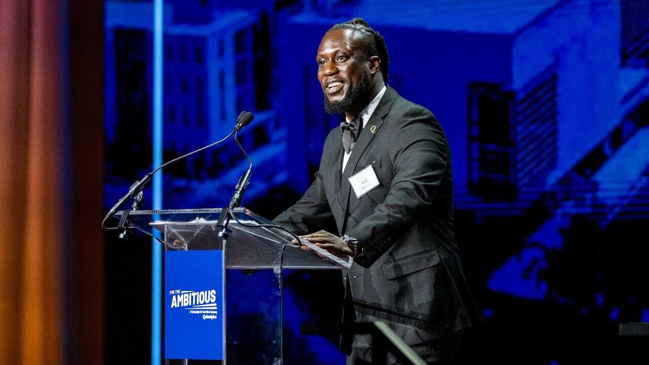 Speaker at the podium at the Quinnipiac Gala