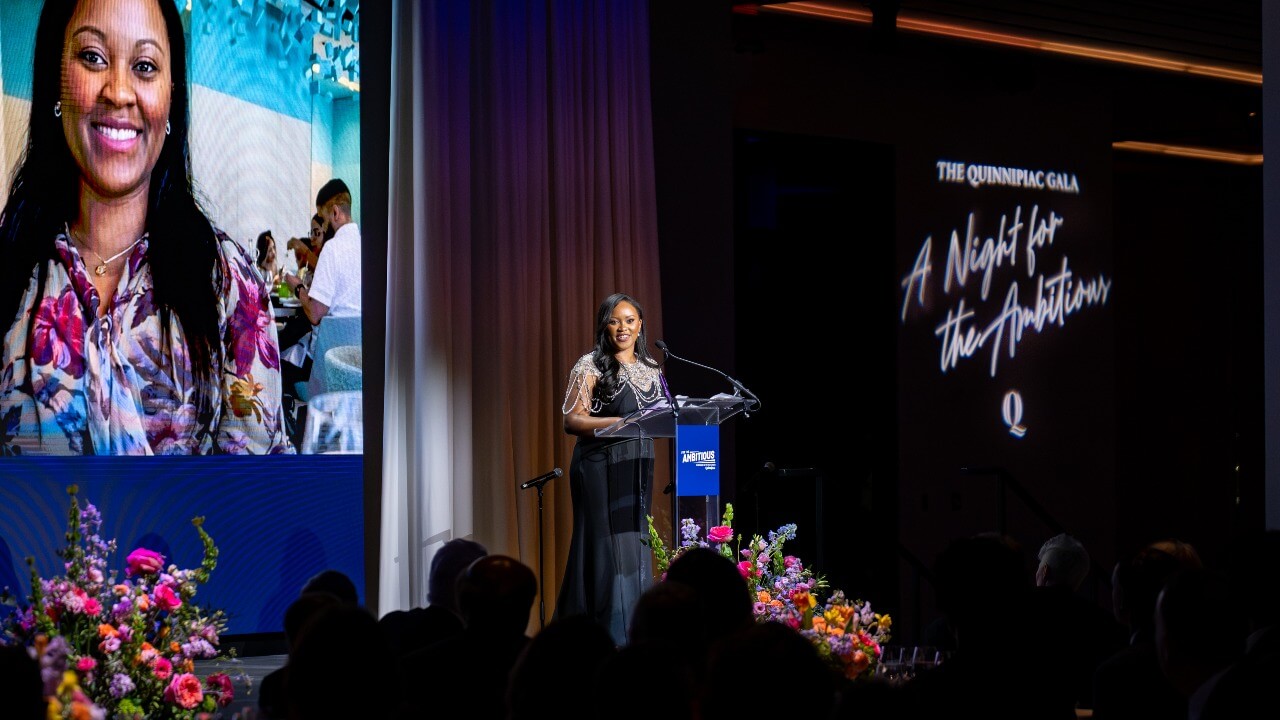 Speaker at the podium at Quinnipiac Gala
