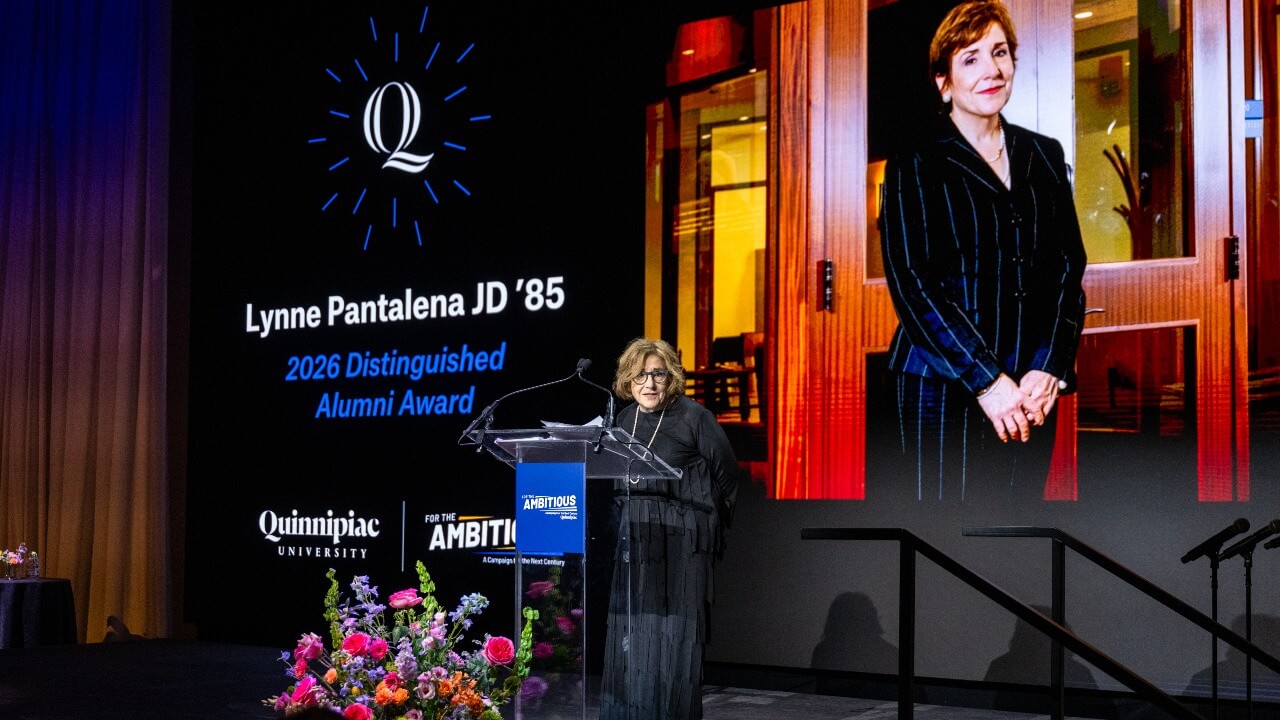 Speaker at the podium at Quinnipiac Gala
