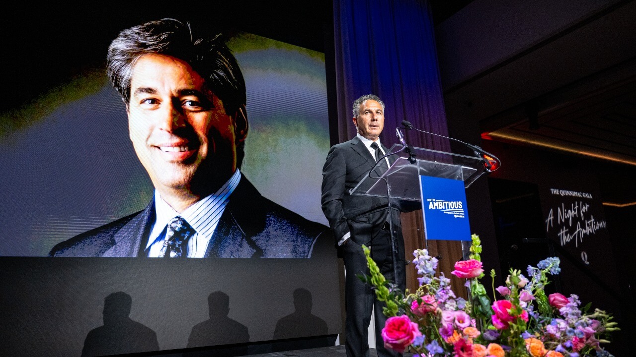 Speaker at the podium at Quinnipiac Gala