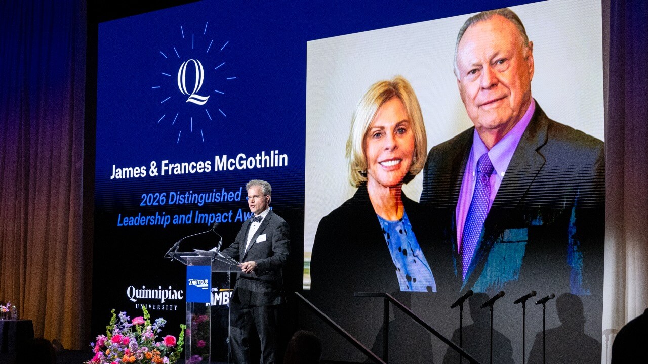 Speaker at the podium at Quinnipiac Gala