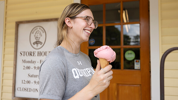 Student enjoying ice cream at a local creamery