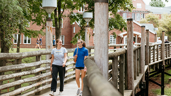 Students walking along the Commons Bridge