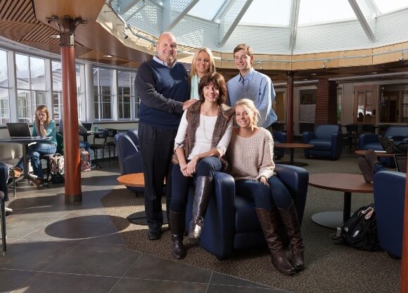Group photo of the Massey family in the Carl Hansen Student Center