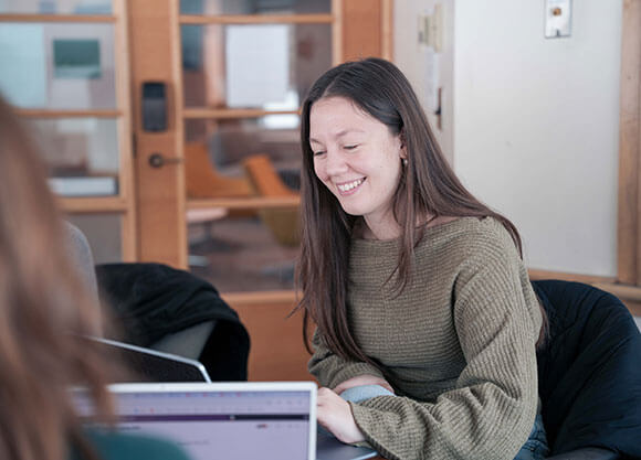 Student working in the School of Communications