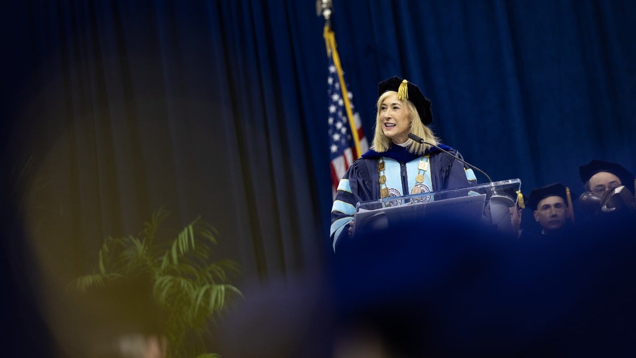 President Marie Hardin speaks at the podium