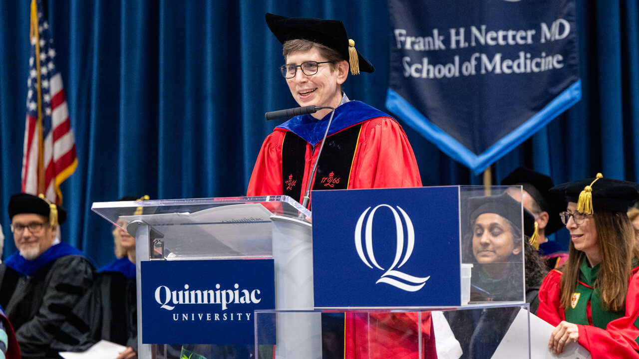 Provost Debra Liebowitz speaks at a podium