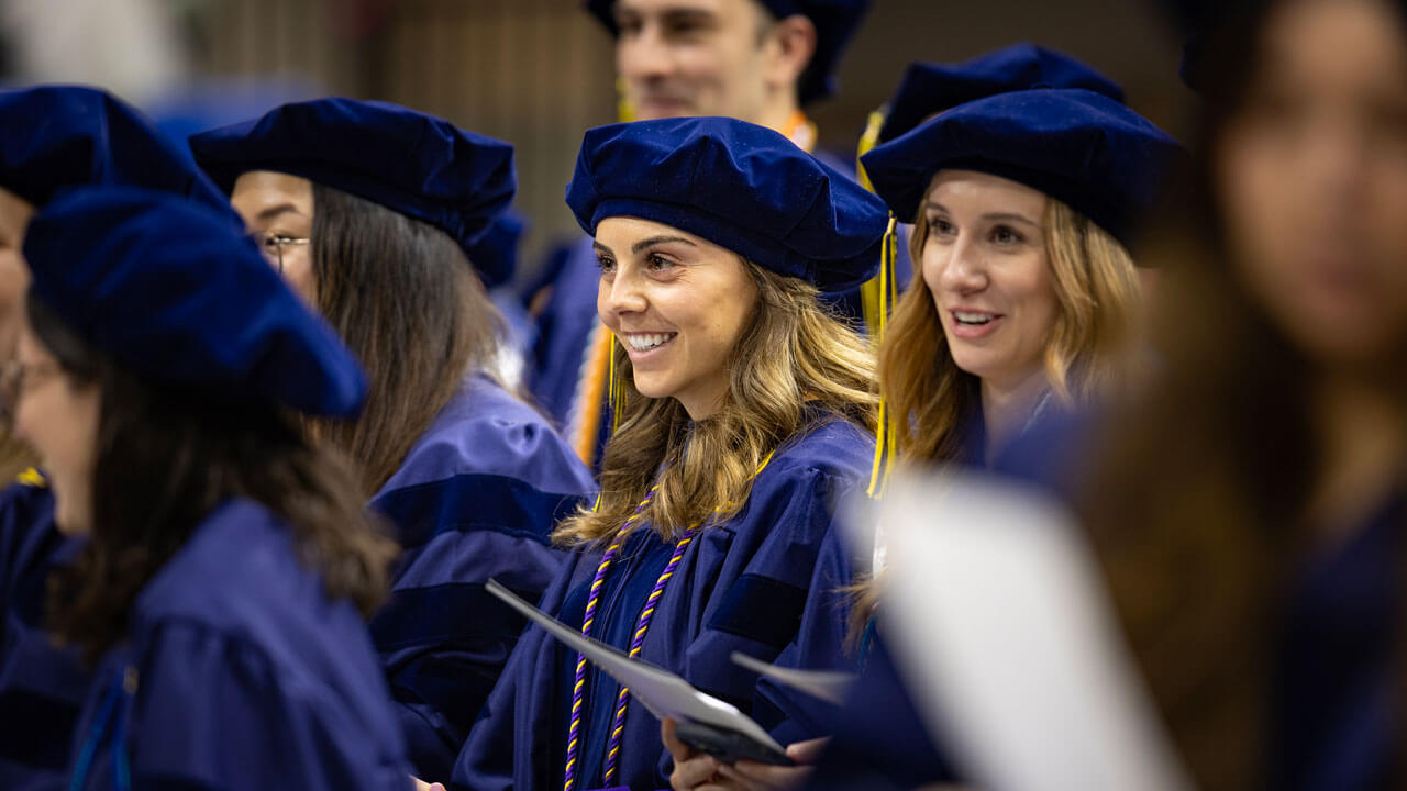 Graduate smiles at stage