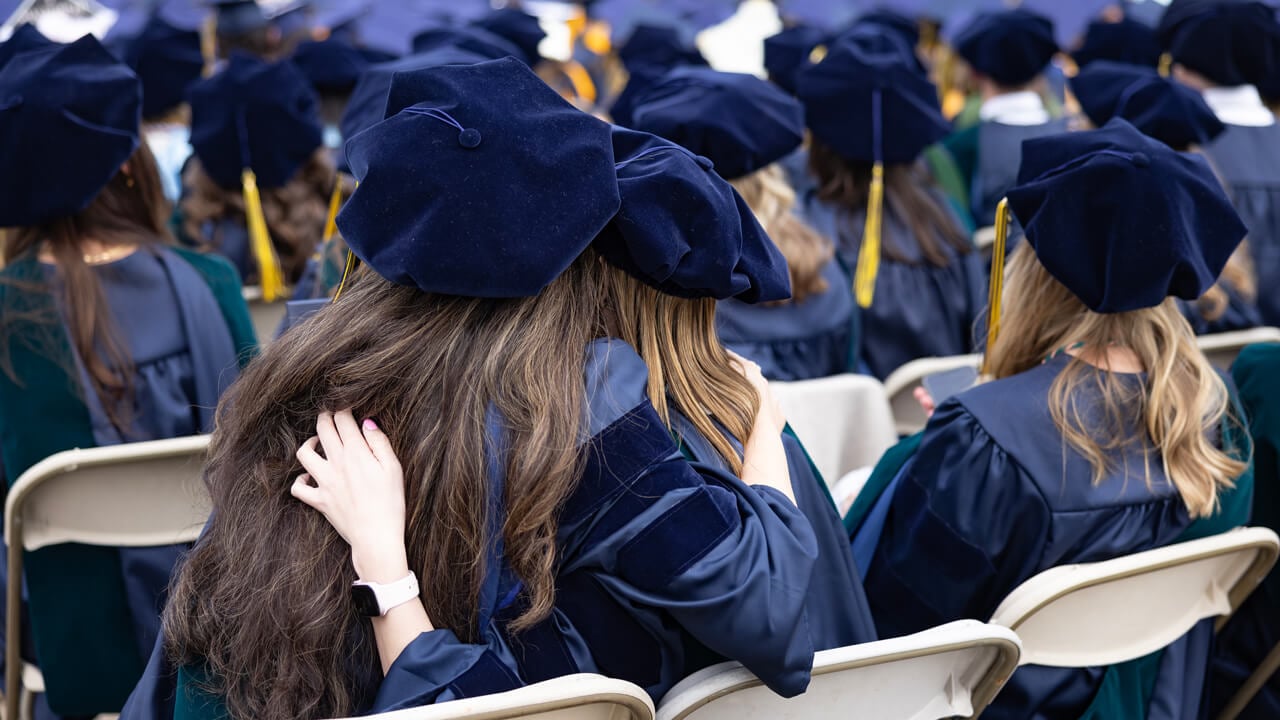 Students hold each other