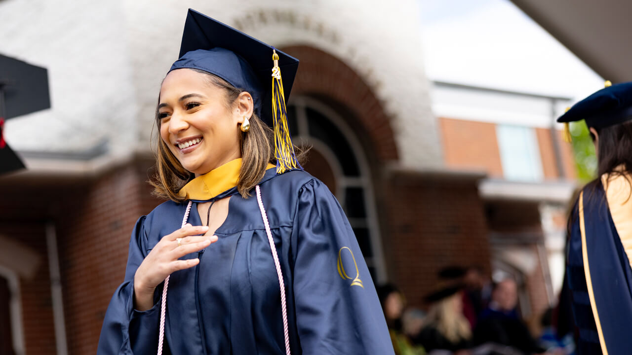 Student walks across stage