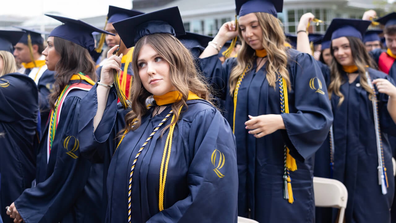 Student turns tassel on cap