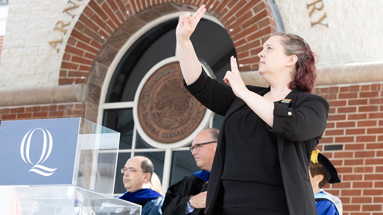 Sign language interpreter on stage